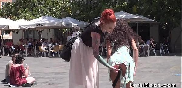  Anal plugged petite slave in public